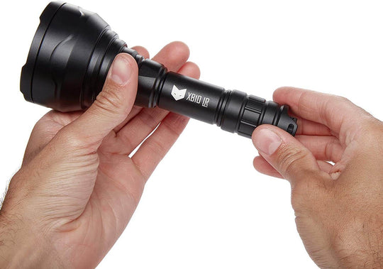 Nightfox XB10 940nm Low Glow Infrared Torch being held with two hands