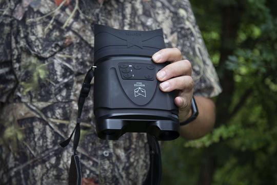 Nightfox Corsac Night Vision Binocular being held with one hand